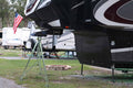 Ultra-Fab King Pin Stabilizer Installed Under Fifth Wheel Trailer at RV Campsite | United RV Parts