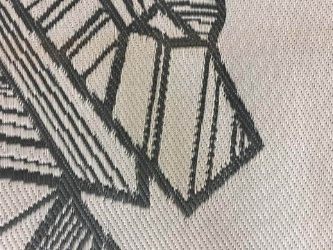 Grey Woven RV Mat Fabric Texture with Geometric Bear Pattern Detail | United RV Parts