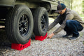 RV Owner Installing Red Andersen Leveling Blocks - Setup View | United RV Parts