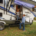 White Tesla RV with Extended Black Electric Steps - Lifestyle Application | United RV Parts