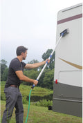 Man Washing RV with Camco Flow-Through Brush - In Use Lifestyle | United RV Parts