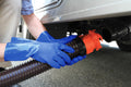 Blue Rubber RV Sanitation Gloves During Sewer Hose Connection | United RV Parts