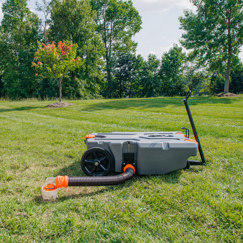 Grey Camco Rhino Tank in Field Setting - Lifestyle Use | United RV Parts