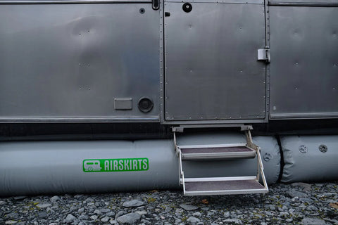 Grey AIRSKIRTS Inflatable Trailer Skirt with Entry Steps - Side Detail on Airstream | United RV Parts
