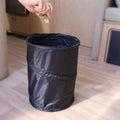 Black Nylon Camco Mini Pop-Up Utility Container 42903 in RV Interior - Lifestyle View | United RV Parts