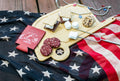 Camco 53089 Retro RV Bamboo Cutting Board Styled with S'mores and Cookies on American Flag - Lifestyle | United RV Parts
