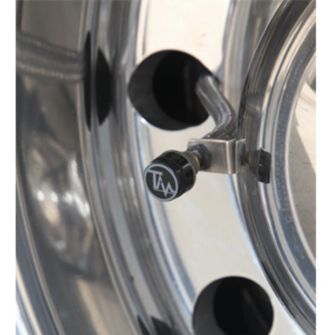 TireMinder Brass Transmitter Installed on Chrome RV Wheel - Side View | United RV Parts