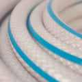 White Blue-Stripe AquaFlex RV Fresh Water Hose Kink-Resistant Texture Close-Up | United RV Parts