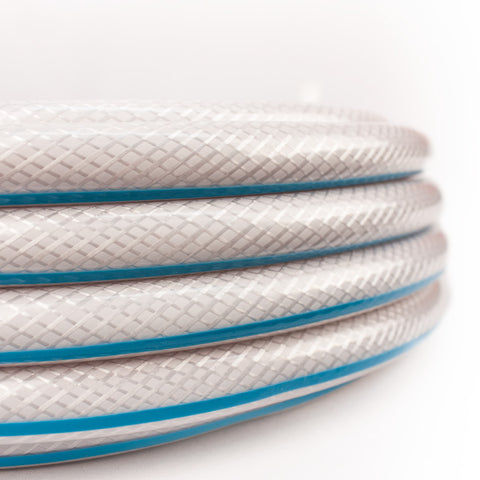 White AquaFlex RV Water Hose Coiled Stack Detail with Blue Stripe - Side View | United RV Parts