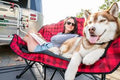 Kuma Lazy Bear Heated Love Seat in Use at RV Campsite - Lifestyle Side View | United RV Parts