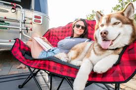 Kuma Lazy Bear Heated Love Seat in Use at RV Campsite - Lifestyle Side View | United RV Parts