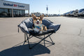 Corgi sitting in Kuma Little Lazy Bear Dog Chair outdoors at RV lot - Lifestyle Shot | United RV Parts