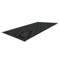 Black Grey Kuma Striped Peaks Outdoor RV Mat 18x9 - Angled View with Bear Logo | United RV Parts