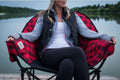 Red Plaid Lazy Bear Camping Chair - Woman Relaxing Outdoors by Lake | United RV Parts