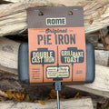 Rome Industry Double Cast Iron Pie Iron 1605 Retail Packaging on Firewood - Package Front View | United RV Parts