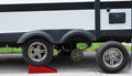 Red Valterra StayPut Trailer Jack A10-0905 under dual axle trailer with tire removed - Side View | United RV Parts
