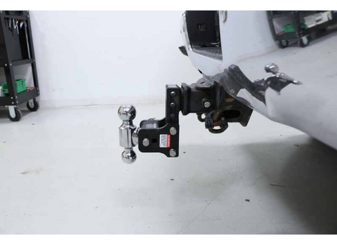Black B&W TS20037B Hitch Mount Installed on Vehicle - Garage Floor View | United RV Parts