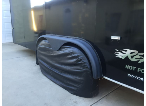 Black ADCO Double Axle Tyre Gard RV Tire Cover - Lifestyle Shot on Trailer | United RV Parts