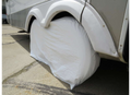 White ADCO Tyre Gard on Single RV Tire with UV Protection - Angle View | United RV Parts