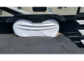 White ADCO Double Axle Camper Tire Cover Fitted on RV Dual Wheels - Lifestyle View | United RV Parts
