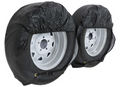 ADCO Ultra Tyre Gard Black Wheel Covers Installed on Two RV Tires - Side Angle | United RV Parts