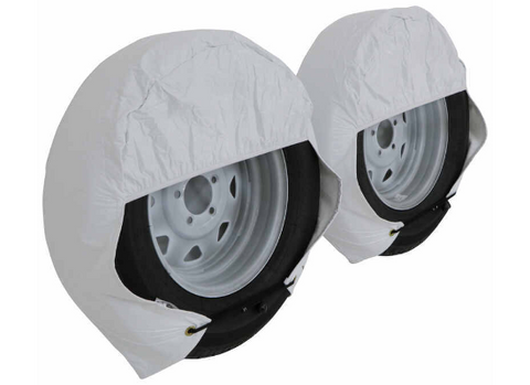 White ADCO Ultra Tyre Gard RV Tire Covers Installed on Trailer Wheels - Side View | United RV Parts
