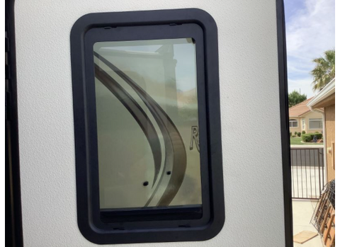 Black RV Entry Door Window Thin Shade - Installed Exterior View | United RV Parts