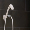 White Oxygenics RV Shower Head in Wall Mount Position - Installation View | United RV Parts