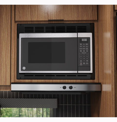 GE RV Microwave GCBK09N1WSS with Black Trim Kit Installed in RV Cabinetry - Front View | United RV Parts
