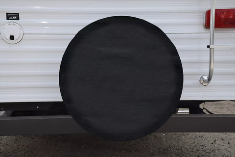 ADCO 1734 Black Spare Tire Cover Installed on RV Travel Trailer - Lifestyle View | United RV Parts