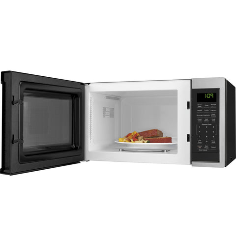 GE RV Microwave GCBK09N1WSS Interior Open - Food on Turntable Lifestyle Shot | United RV Parts